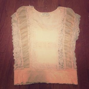 Free people top it’s a light peach color